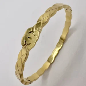 Gold Quilted Pattern Bangle with CC Logo Centrepiece | Stainless Steel | Zeray