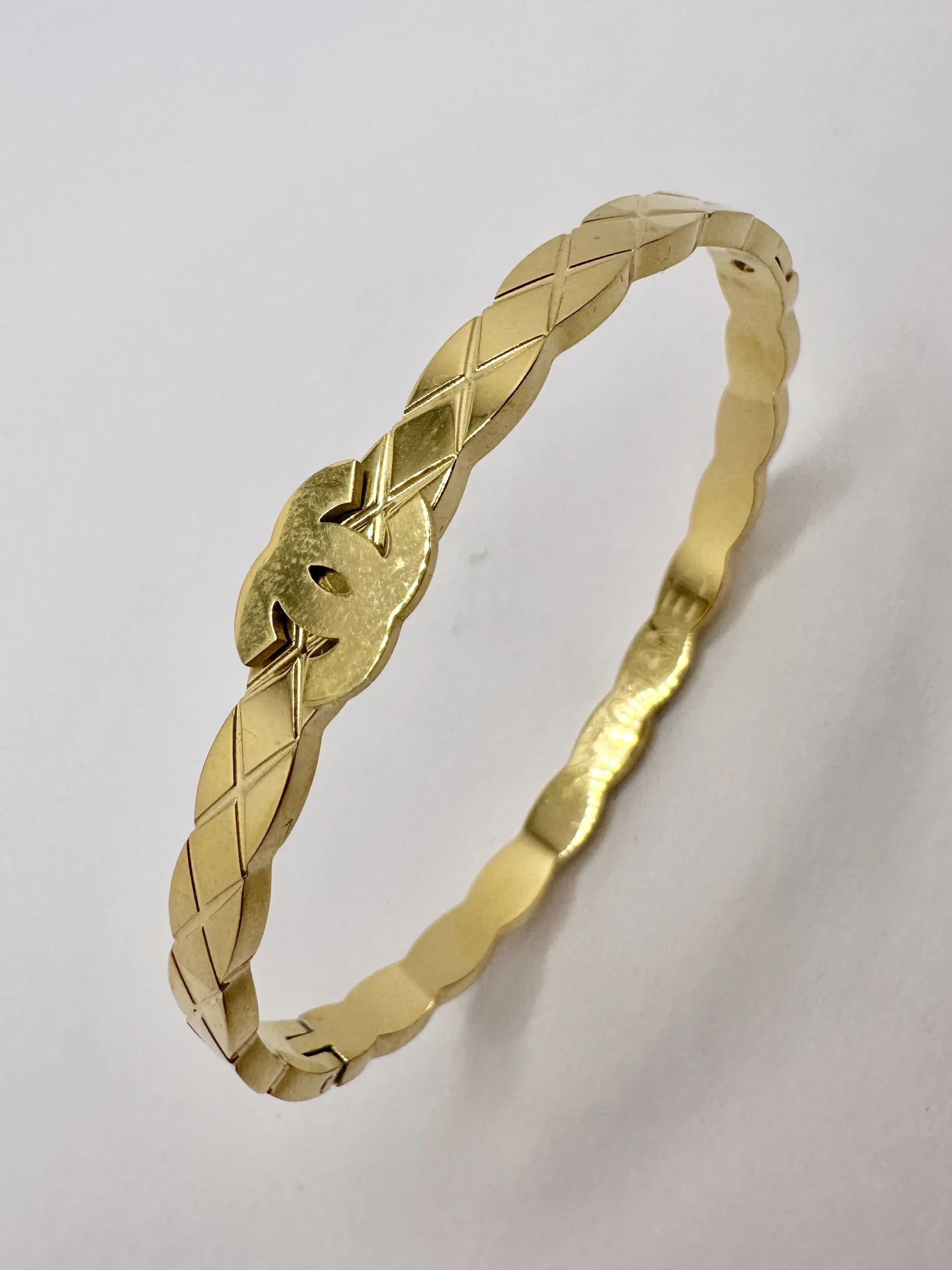Gold Quilted Pattern Bangle with CC Logo Centrepiece | Stainless Steel | Zeray