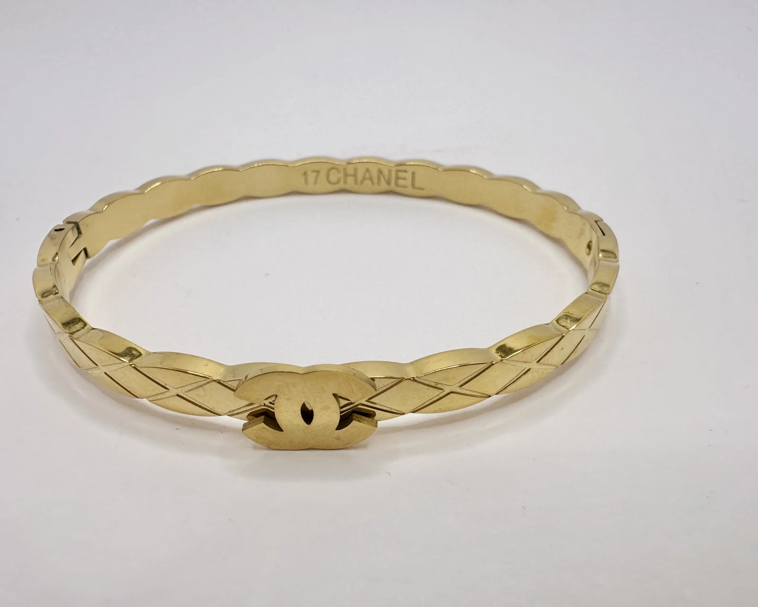Gold Quilted Pattern Bangle with CC Logo Centrepiece | Stainless Steel | Zeray - Image 4